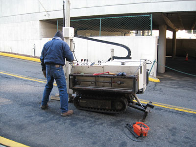 Photo of Statewide Environmental Services technician used geo-probe drilling technology to test soil for contaminants.