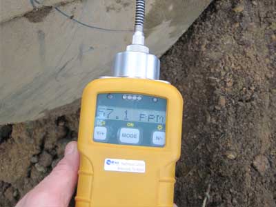 Photo of yellow probe used by Statewide Environmental Services technicians to test soil for contaminants.