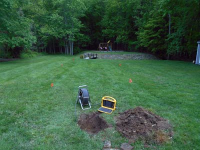 Photo of Statewide Environmental technician preparing camera for a system inspection, one of the septic services the company offers.